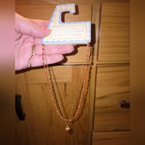 A New Day Gold Necklace with Red Beads